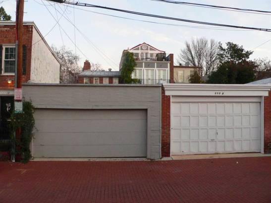 The owner of this property had hoped to build a guest room over his garage, but was opposed, so he built the rear addition with a new third floor, which was approved.