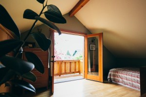 French doors from the loft open onto the balcony