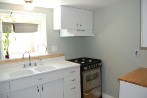 the kitchen is bright and airy